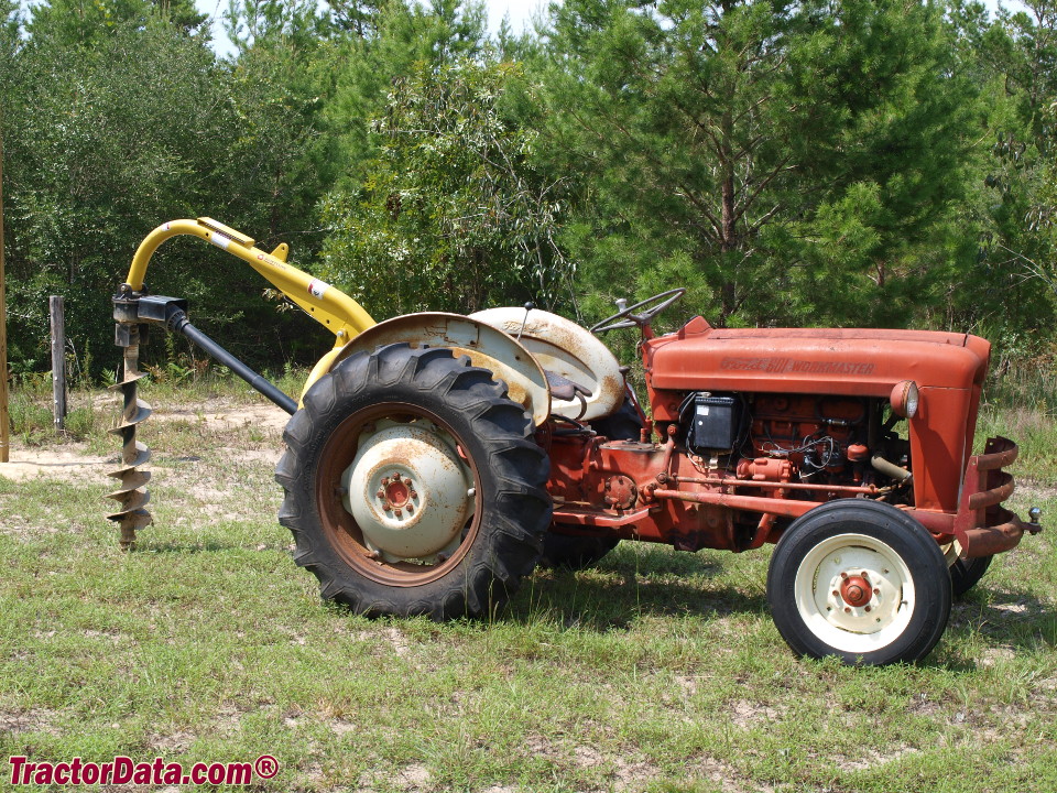 Ford 651 with post-hole digger, right side.