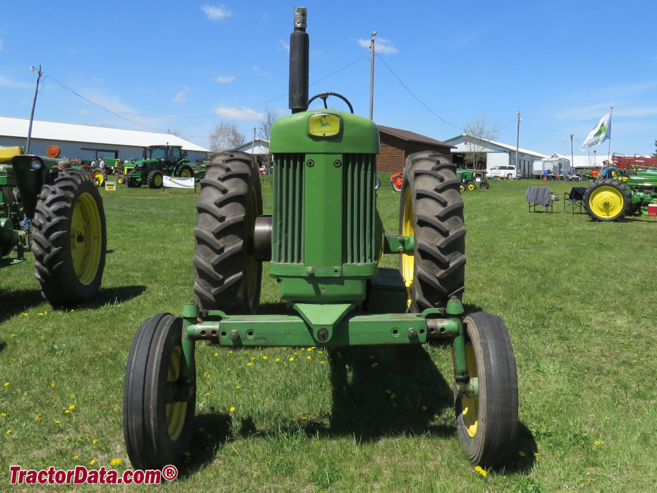 John Deere 630 tractor with wide front end.