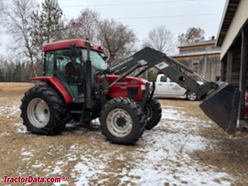 Case International CX80 utility tractor with aftermarket loader.