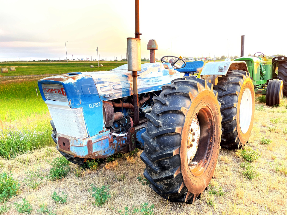 County 954 tractor, front-left view.