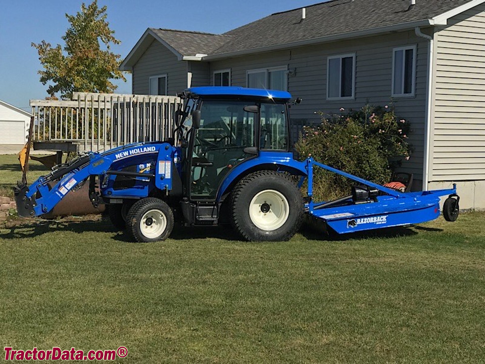 New Holland Boomer 37 with loader and rotary cutter.